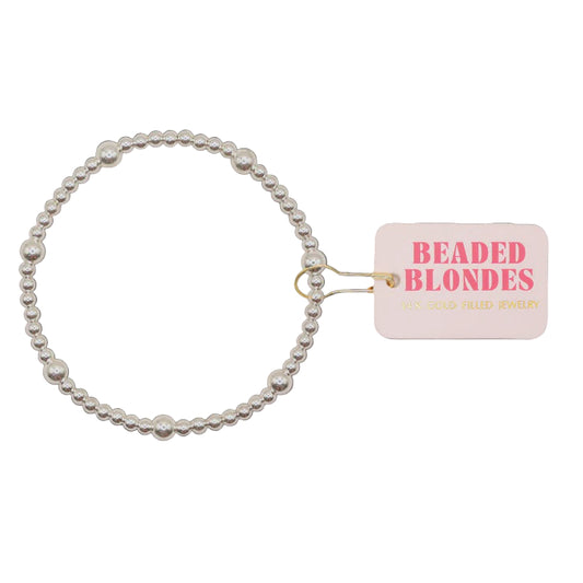 Silver Bracelet with a 'Beaded Blondes' tag on a white background