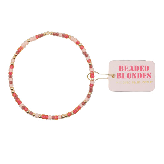 Beaded bracelet with a 'Beaded Blondes' tag on a white background