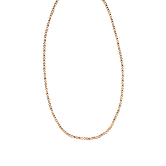 Gold necklace on a white background
