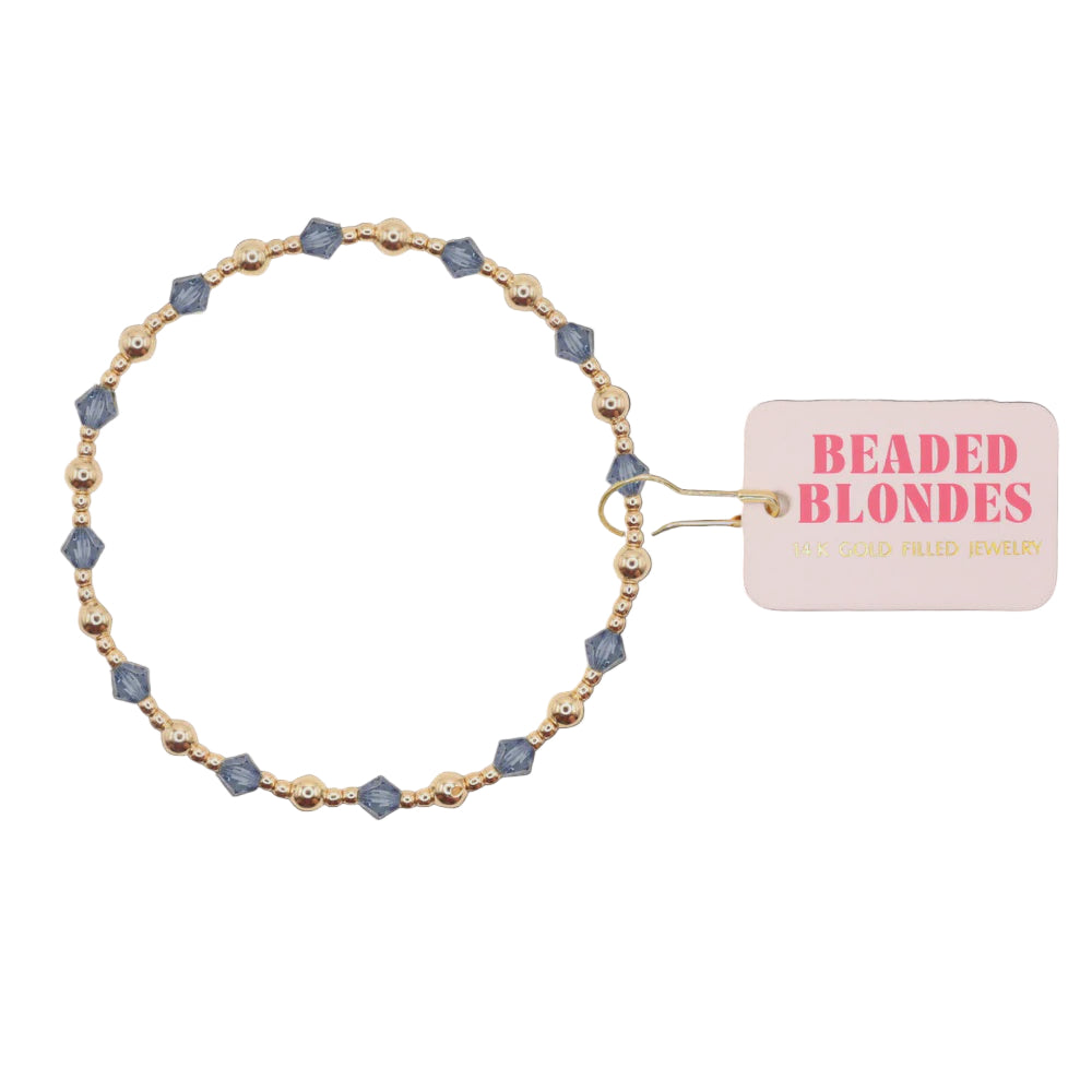 Beaded bracelet with 'Beaded Blondes' tag on a white  background