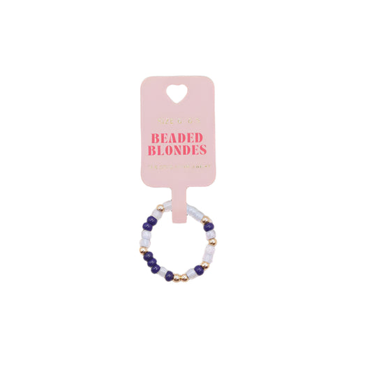 Beaded ring on a pink card with 'Beaded Blondes' branding against a white background