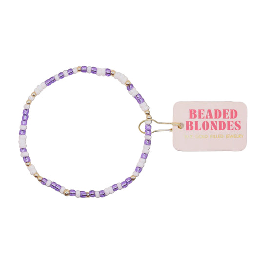 Beaded bracelet with a 'Beaded Blondes' tag on a black background