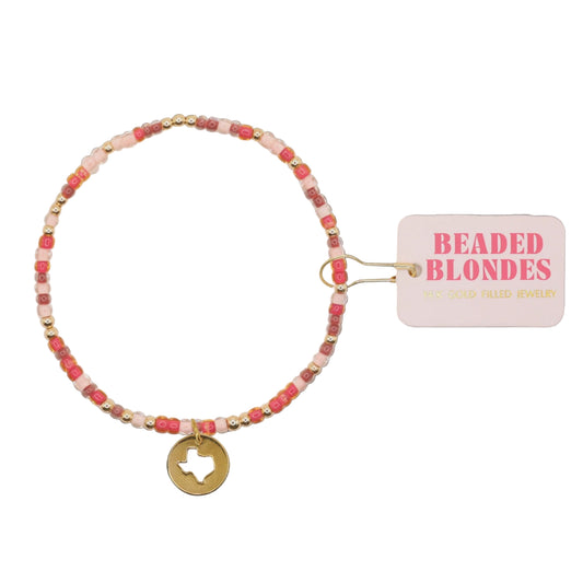 Beaded bracelet with a Texas charm on a white background, featuring the brand 'Beaded Blondes'.
