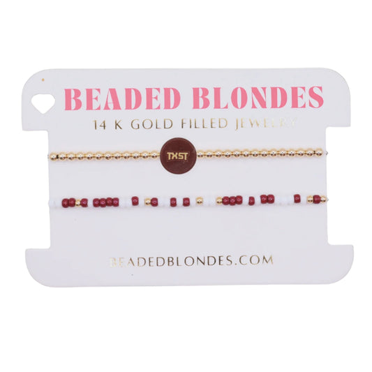 Beaded blondes jewelry card with two gold and red beaded bracelets
