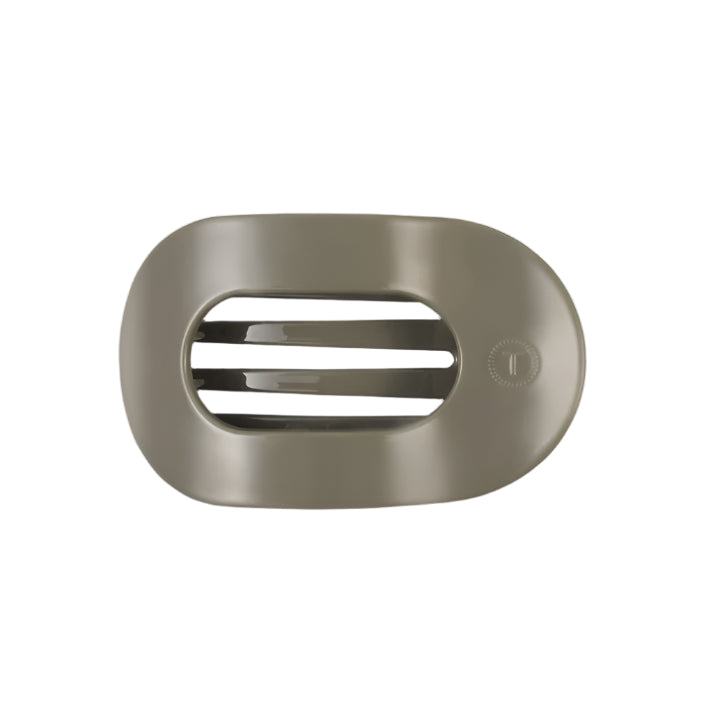 Sage hair clip with a brand logo on a white background