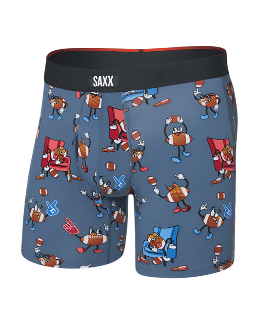 Blue boxer briefs with cartoon character pattern and SAXX branding on a white background