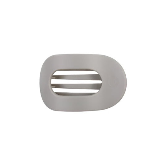 Gray hair clip with a brand logo on a white background