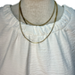 Solid Ruffle Neck Sleeveless Top Off White