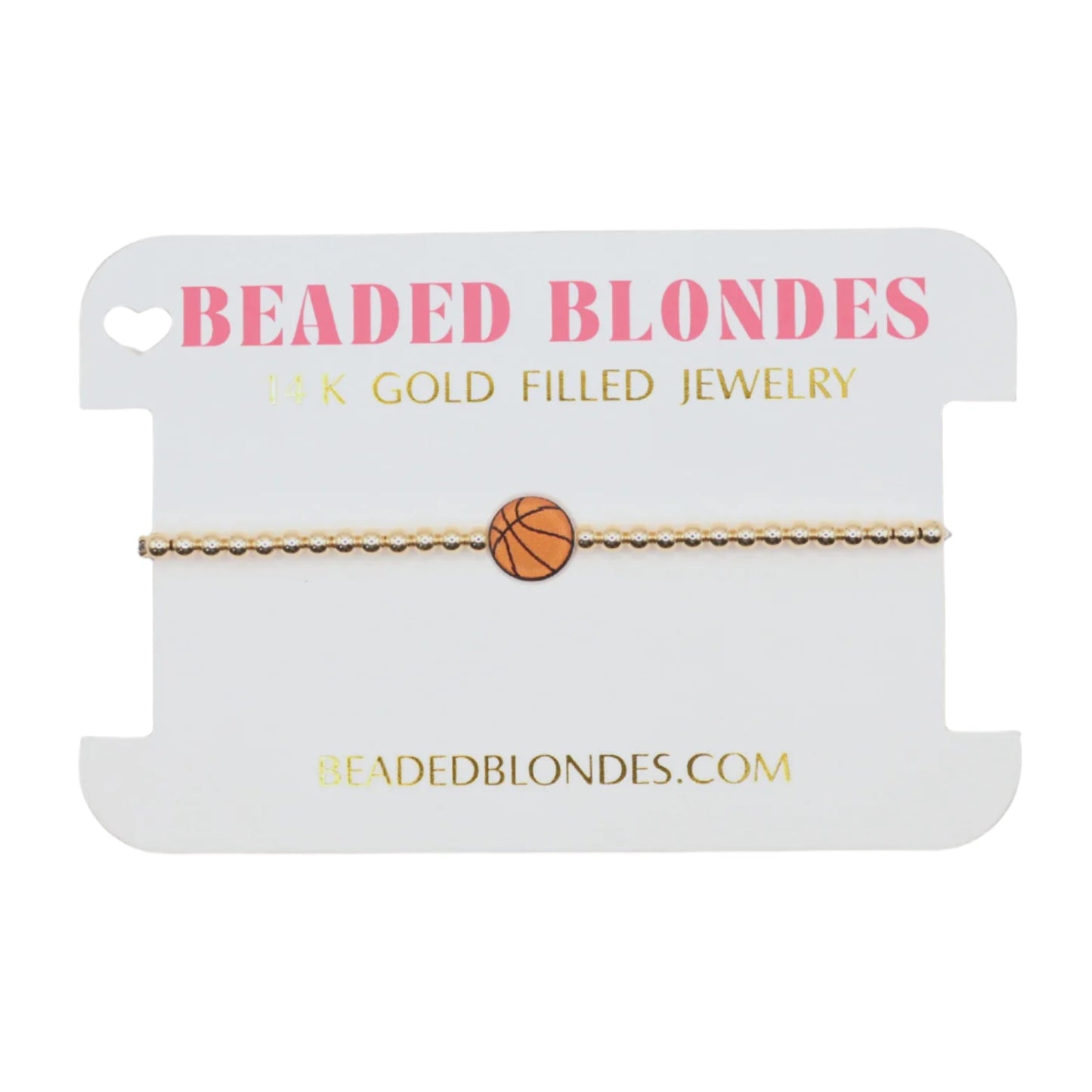 Gold bracelet with basketball charm on a 'Beaded Blondes' branded card.