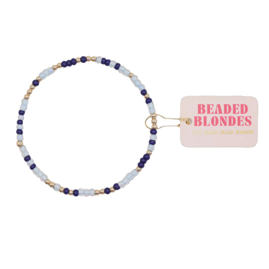 Beaded bracelet with a 'Beaded Blondes' tag on a black background