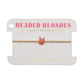 Gold bracelet on a 'Beaded Blondes' branded card with a white background