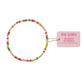 Colorful beaded hair tie with a pink label on a white 
background