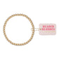 Beaded hair tie with a 'Beaded Blondes' tag on a white background