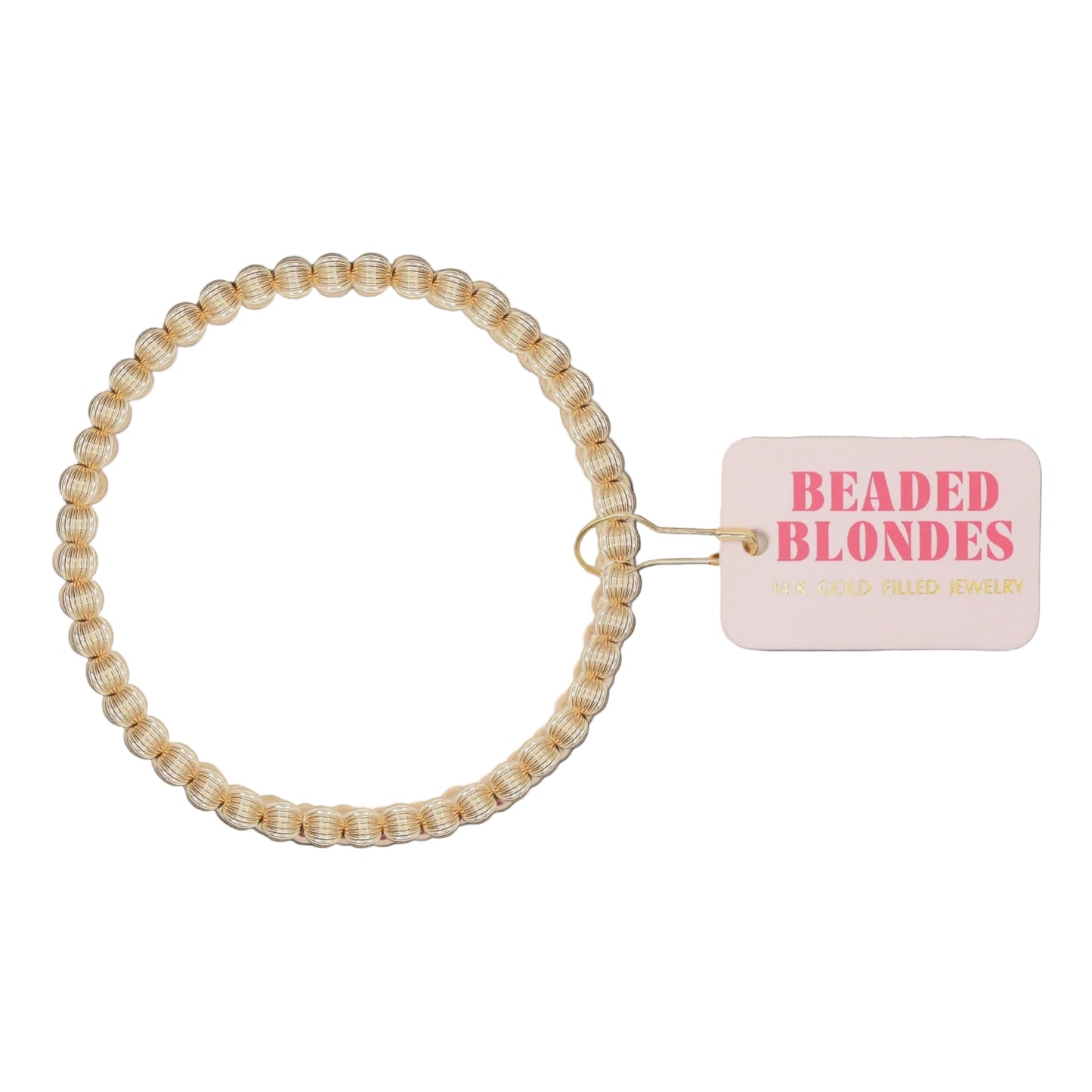 Beaded hair tie with a 'Beaded Blondes' tag on a white background