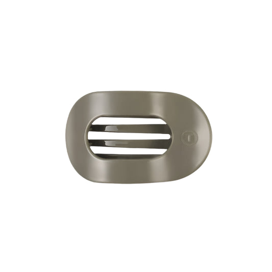 Sage hair clip with a brand logo on a white background
